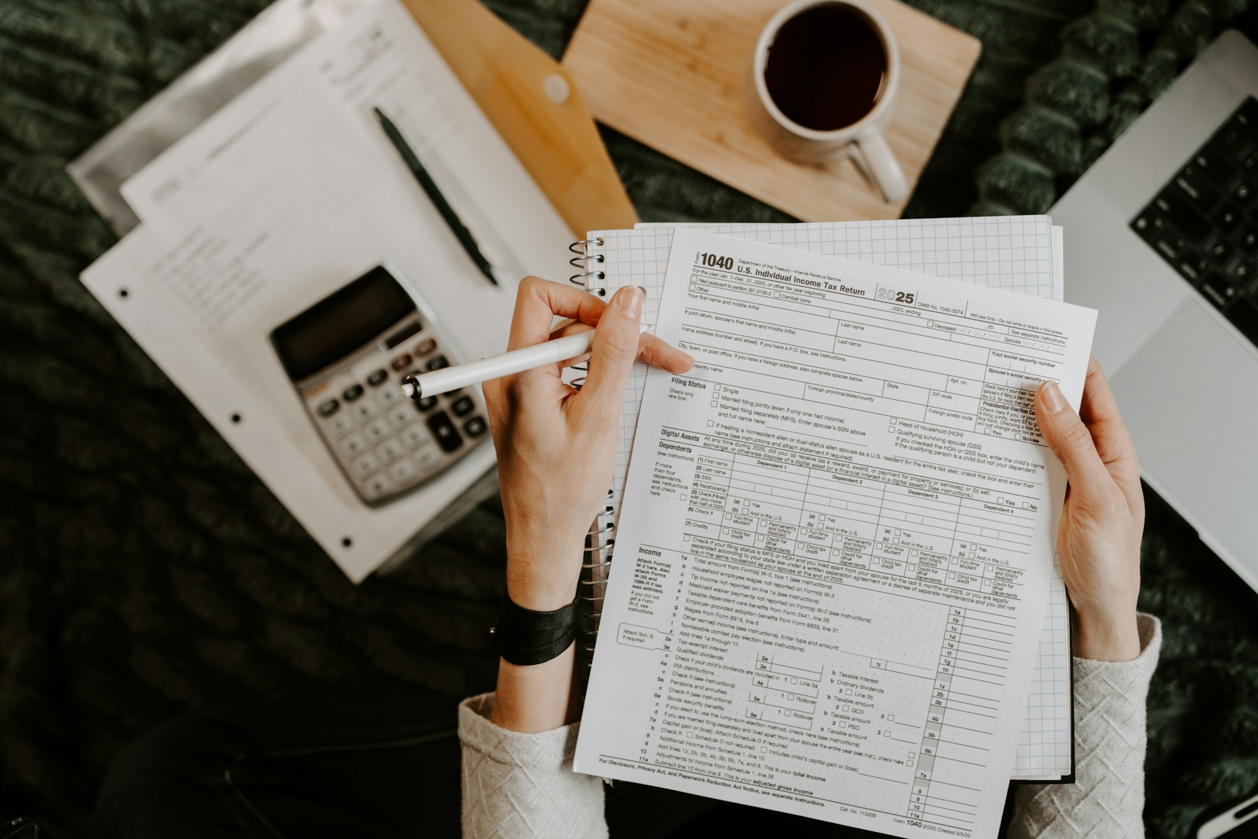 Business owner reviewing financial documents and working capital needs